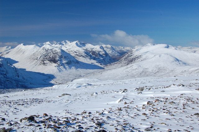 Snow-covered peaks around Glen Coe seen from the hills above the A82, a highlight of any 7 day Scotland itinerary