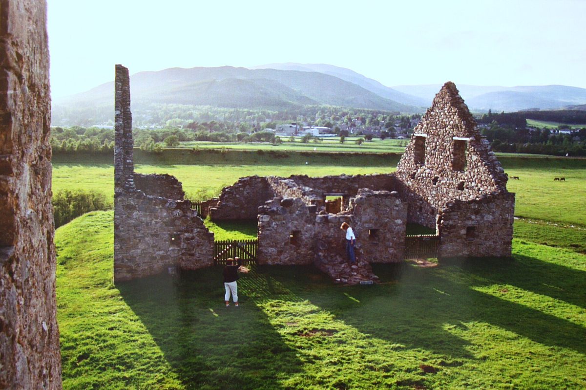 Ruthven Barracks near Kingussie in evening light, with Badenoch beyond