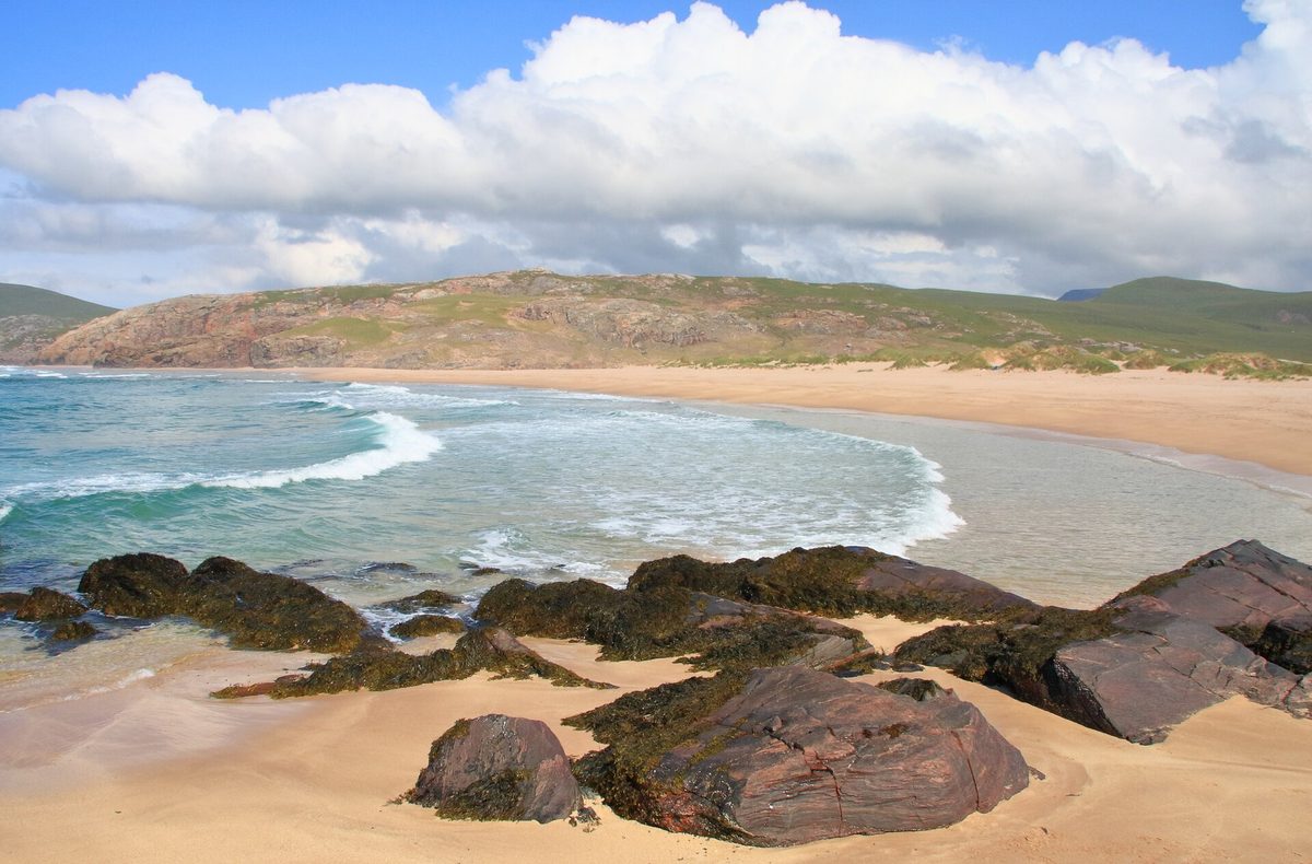 Sandwood Bay in Sutherland with the Am Buachaille sea stack at the southern end