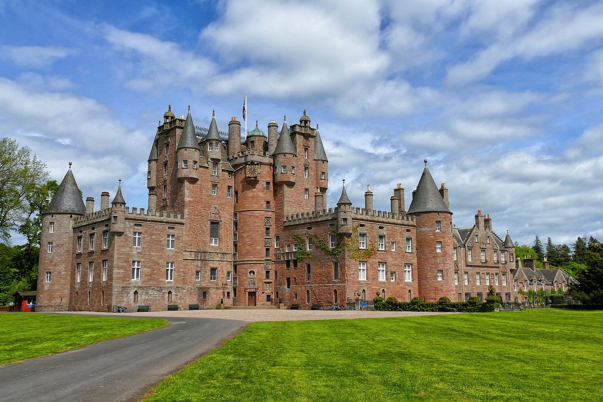 Glamis Castle in Angus at the end of its tree-lined avenue
