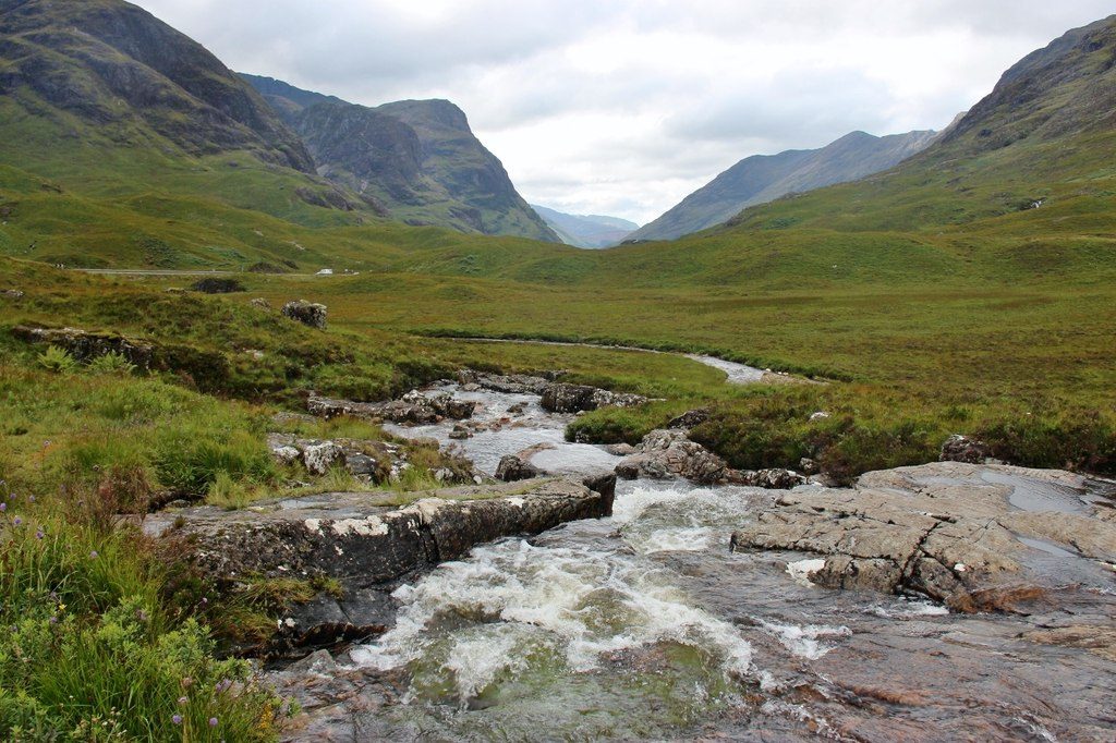The Three Sisters of Glen Coe above the River Coe beside the A82