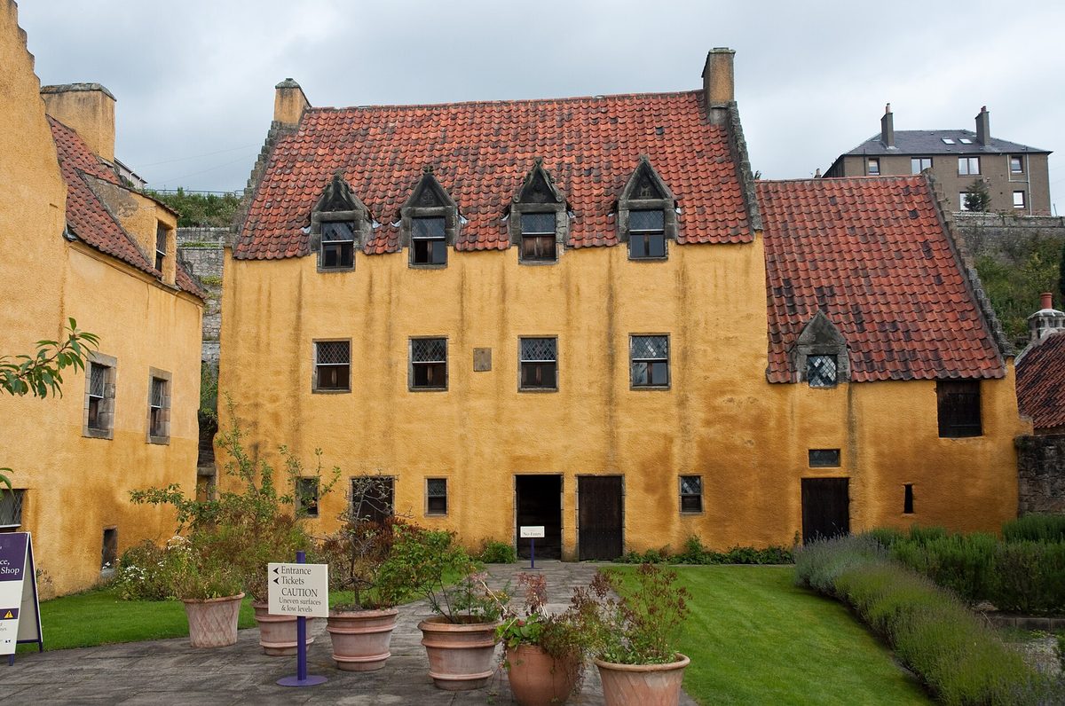 The ochre walls and red pantile roofs of Culross Palace in the royal burgh of Culross, Fife