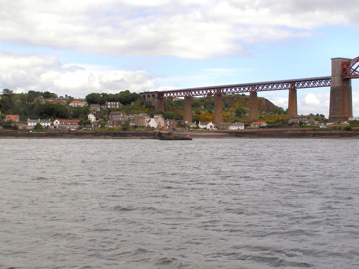 The red cantilever Forth Bridge crossing the Firth of Forth at Queensferry, a 15-minute train ride from Edinburgh