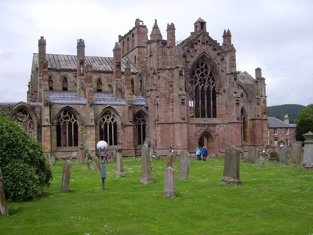 The red sandstone ruins of Melrose Abbey in the Scottish Borders, an hour from Edinburgh by rail