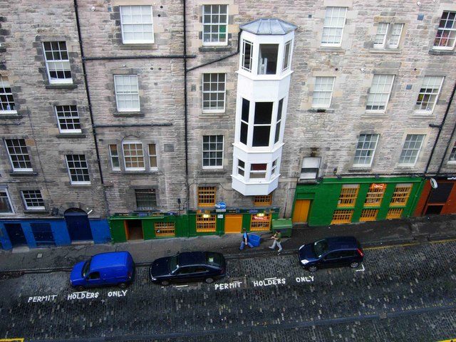 Niddry Street off Edinburgh's High Street, with bar frontages that lead down into South Bridge vault chambers