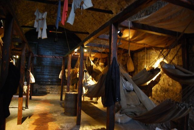 Reconstructed prisoner hammocks in the vaults beneath Edinburgh Castle, a separate site from the South Bridge vaults