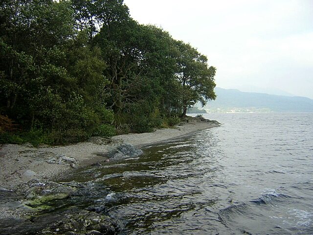 The wooded shore of Loch Lomond, which the A82 hugs on the narrow west-side stretch