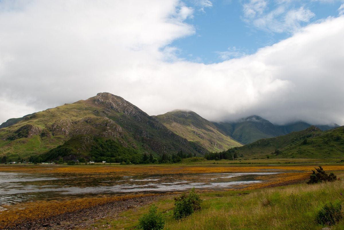 The Five Sisters of Kintail rising above the head of Loch Duich near Eilean Donan Castle