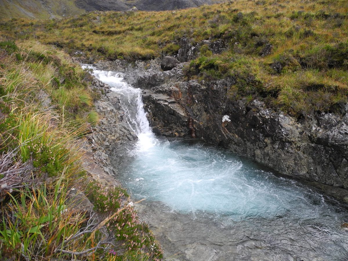 One of the smaller Fairy Pools on Skye, showing the true scale of the pools beside the heather