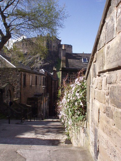 Edinburgh Castle seen from the stone steps of the Vennel above the Grassmarket, a free viewpoint