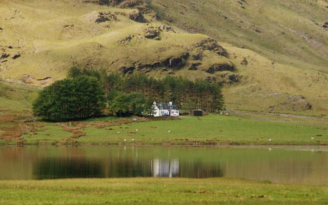 Loch Achtriochtan on the floor of Glencoe, with the white house at Achnambeithach