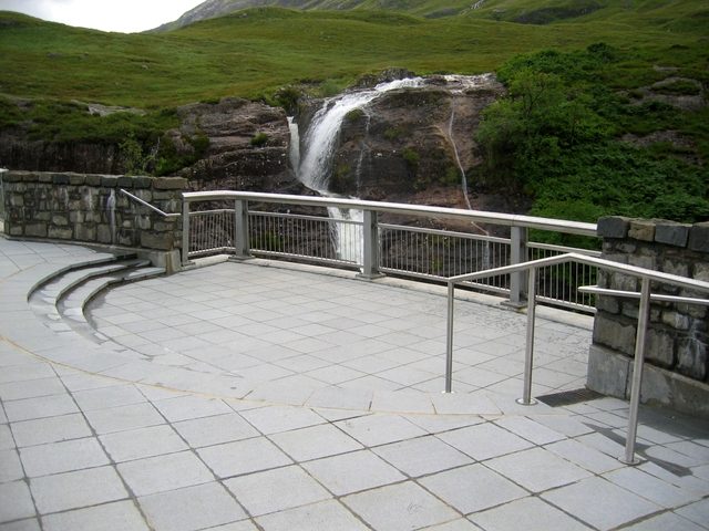 The stone viewing platform beside the falls at the Lairig Eilde bridge in Glencoe