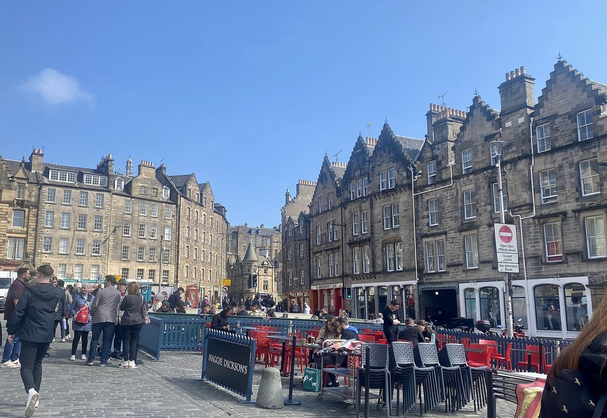 The Grassmarket in Edinburgh on a clear day, at the foot of the Vennel steps