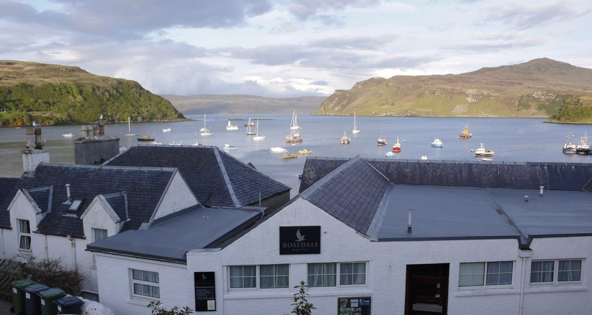 Boats moored in Portree harbour, the most practical base for an Isle of Skye itinerary