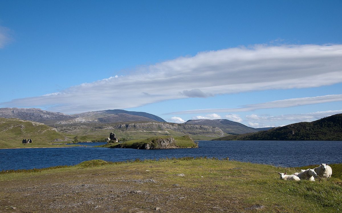 Ardvreck Castle on its promontory in Loch Assynt, Sutherland, seen from the A837