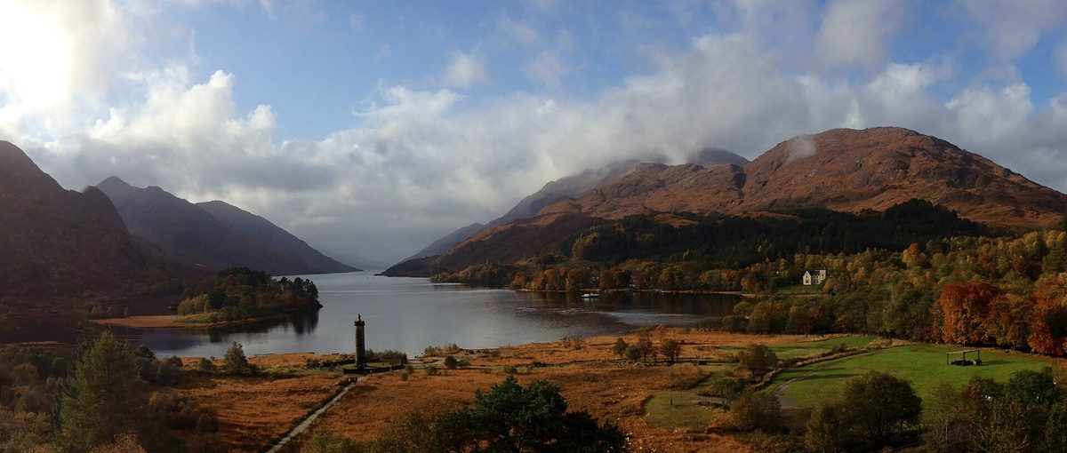 Glenfinnan Viaduct curving above Loch Shiel in the West Highlands