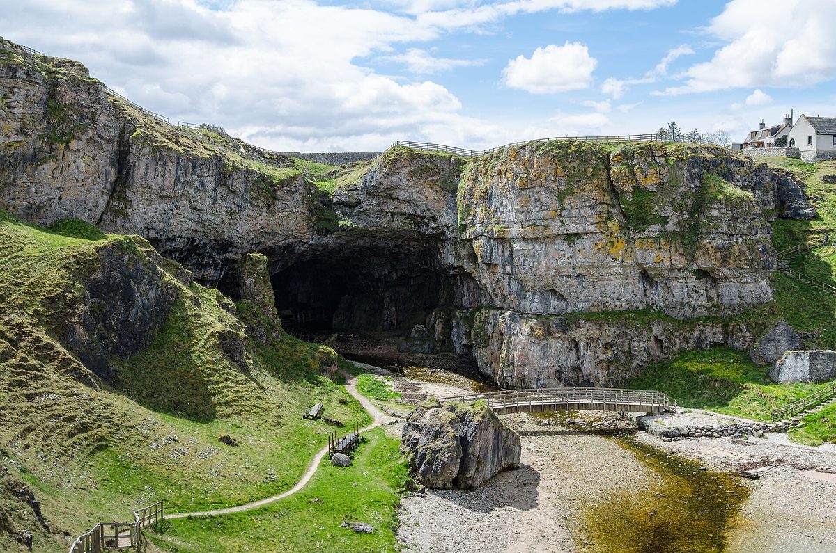 The vast limestone entrance to Smoo Cave at Durness on the north coast of Scotland