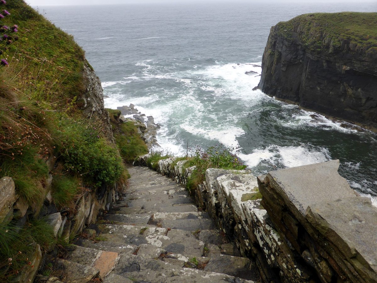 The stone Whaligoe Steps zigzagging down the cliff to the old herring harbour in Caithness
