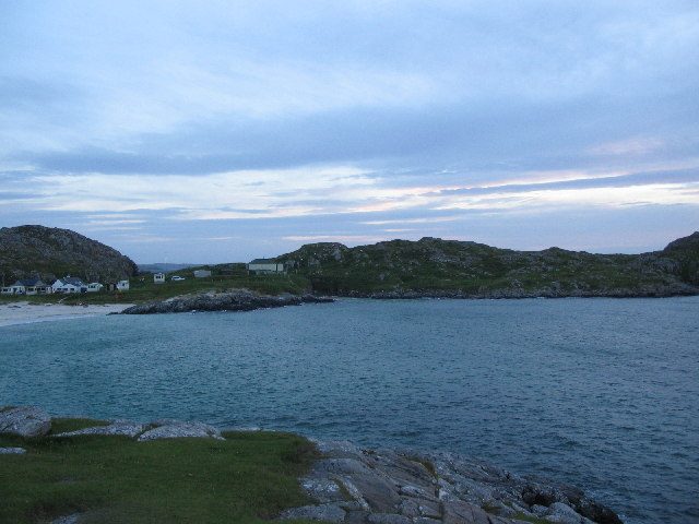 Achmelvich Bay near Lochinver at dusk, with the campsite above the beach