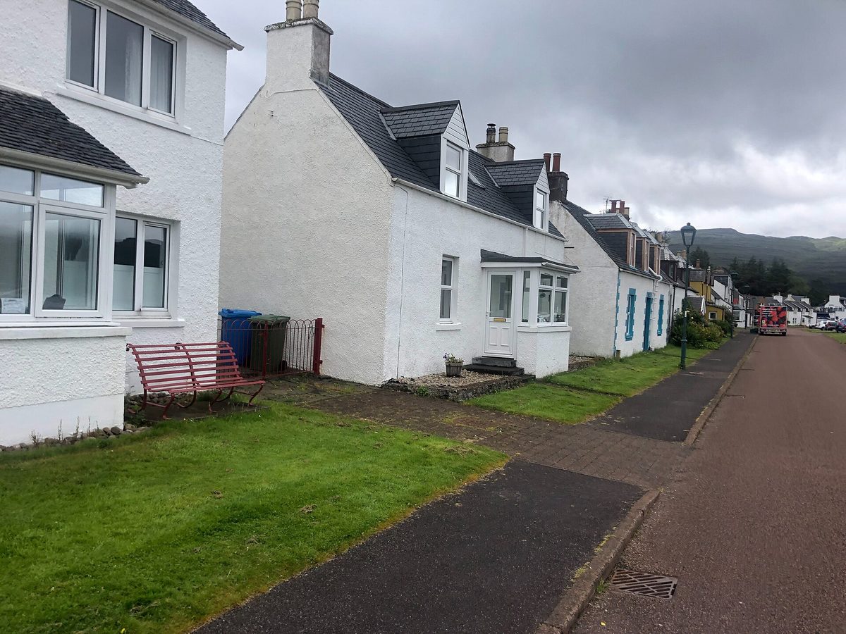Whitewashed cottages along the shore road at Shieldaig in Wester Ross