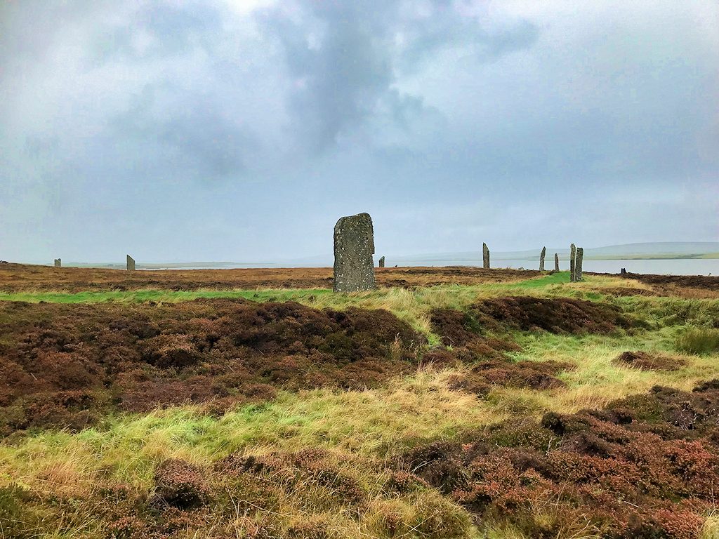 The Ring of Brodgar on Orkney, standing stones under wide dark skies