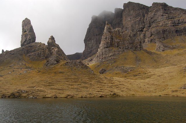 Needle Rock and the pinnacles of the Sanctuary below the Storr cliffs, with cloud on the summit