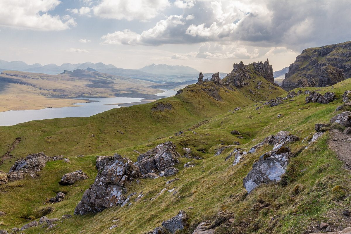 The view from the flank of the Storr over the Storr Lochs, with the Old Man of Storr pinnacles on the right