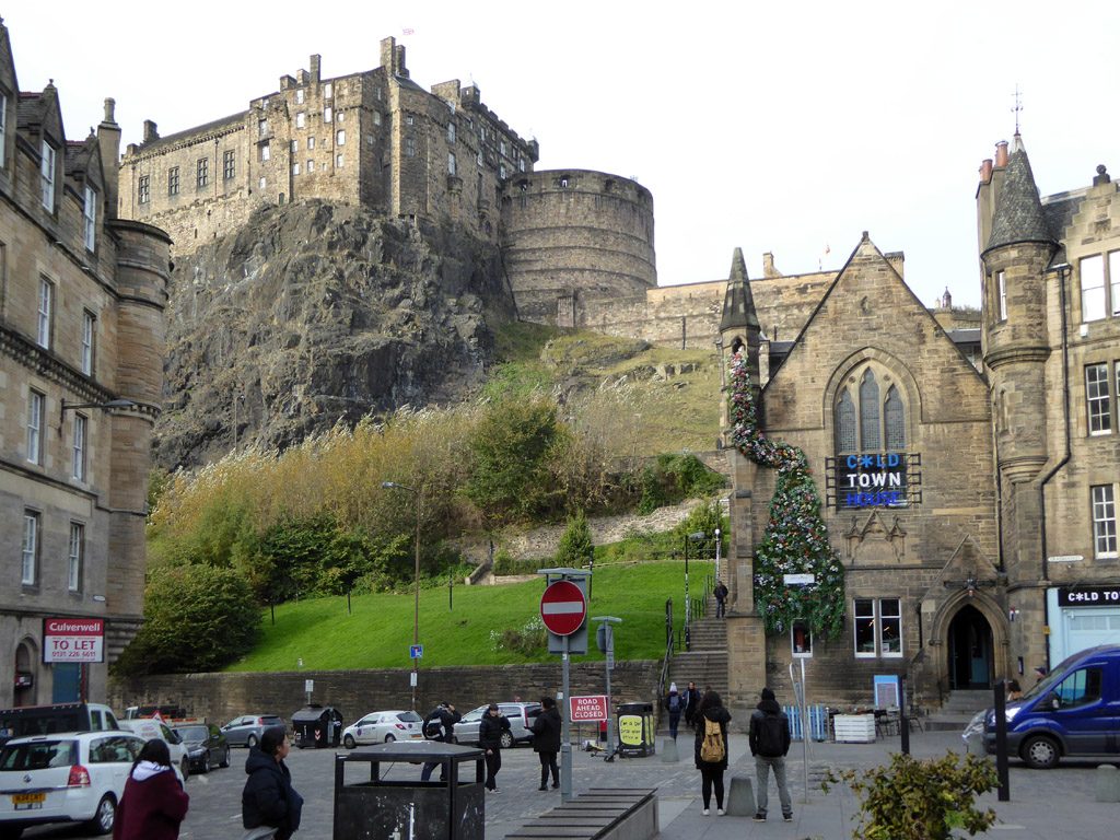 The Grassmarket in Edinburgh with the castle rock rising directly above it
