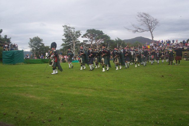 A pipe band at the Skye Highland Games on The Lump above Portree