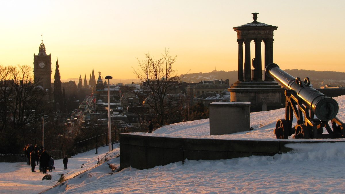 View over Edinburgh from Calton Hill at sunset, a free romantic viewpoint in Scotland