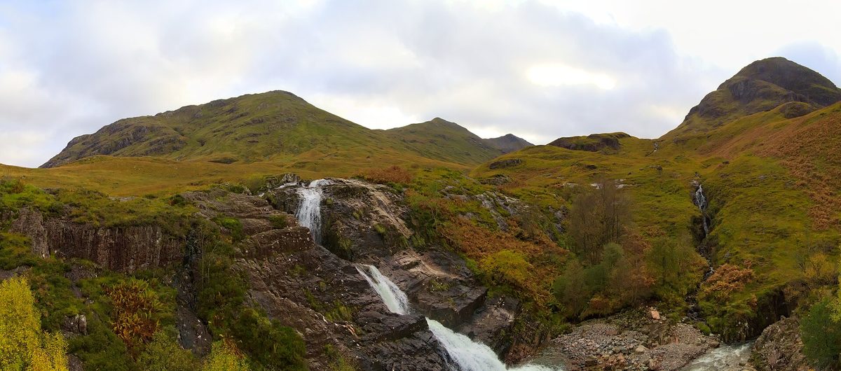 Waterfalls and orange bracken on the flanks of Glen Coe in October