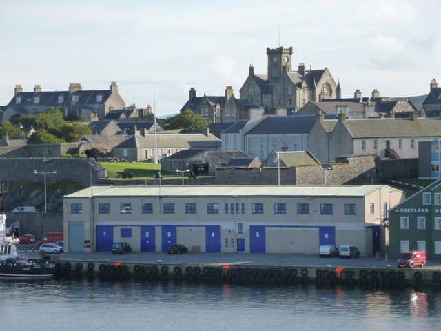 Lerwick harbour in Shetland under a bright northern sky