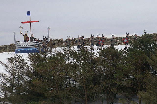 An Up Helly Aa squad and galley in the snow in Shetland in January