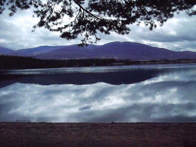 Loch Morlich and Cairn Gorm under broken cloud near Aviemore