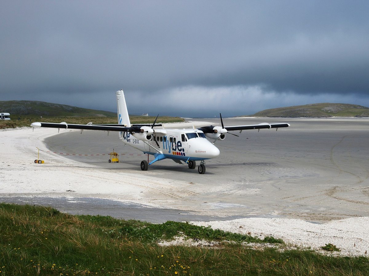 An aircraft parked on the sand at Barra Airport, the only beach runway used by scheduled flights