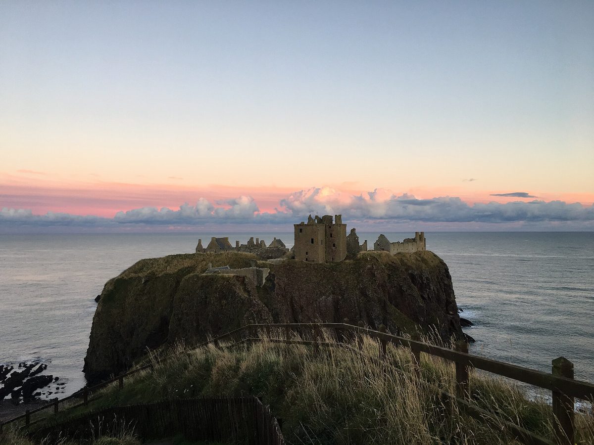 Dunnottar Castle at dusk from the northern clifftop, the best light for photographs
