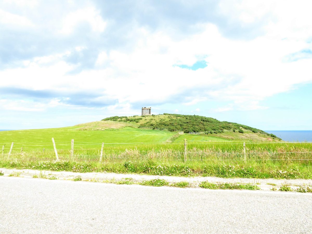 The unfinished stone temple of Stonehaven war memorial on Black Hill, passed on the coastal walk