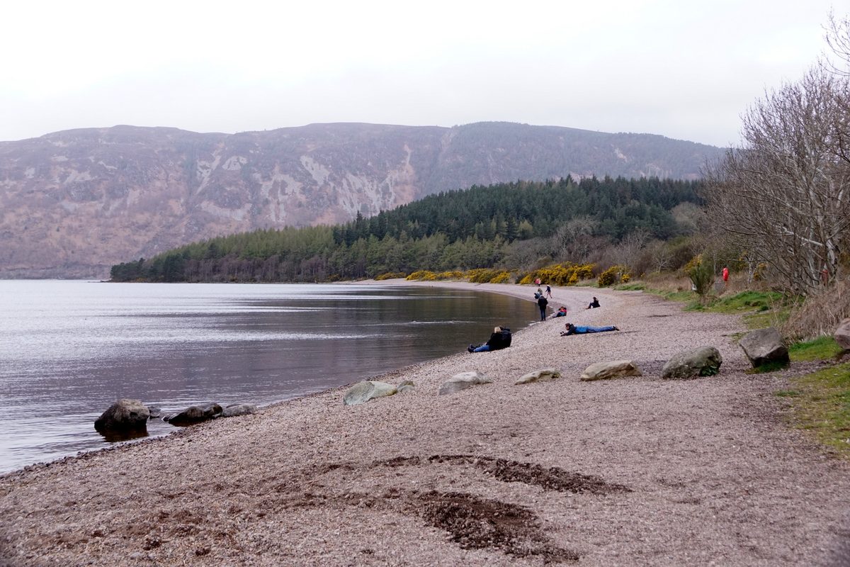 The shingle beach at Dores looking down the full length of Loch Ness