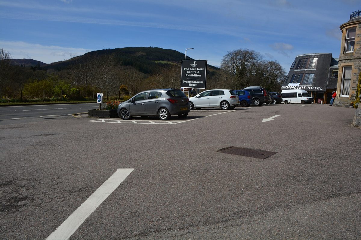 The Loch Ness Centre and Exhibition sign at Drumnadrochit on the A82