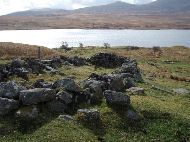 Ruined stone walls of the cleared Grummore township beside Loch Naver in Strathnaver, Sutherland